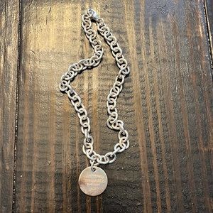 Tiffany charm necklace. Sterling silver. Just needs to be polished